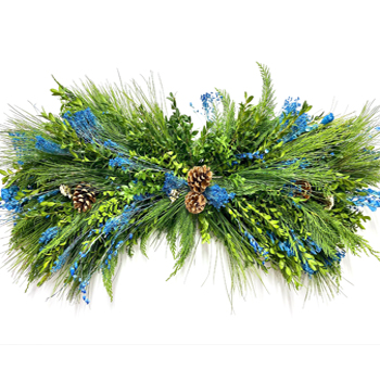 Hanukkah centerpiece with festive blue and white blooms, perfect for seasonal events and weddings.