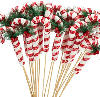 Red, white and green holiday candy cane flower picks for floral arrangements in bulk.