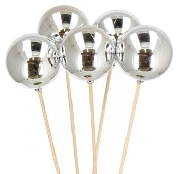 Add a touch of elegance to your holiday floral arrangements with shimmering silver Christmas decorative sticks.