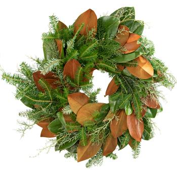 Country Christmas Wreath with magnolia leaves, noble fir, and cedar branches. Rustic elegance for festive holiday décor indoors or outdoors.