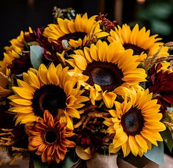 Vibrant sunflower bouquet with yellow blooms and green foliage, ideal as a wedding centerpiece to add warmth, charm, and timeless elegance.