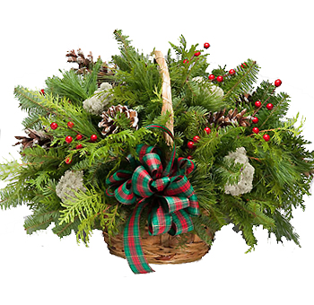 Fresh Christmas greenery arrangement with pinecones, red berries, cedar, and plaid ribbon for festive holiday décor.