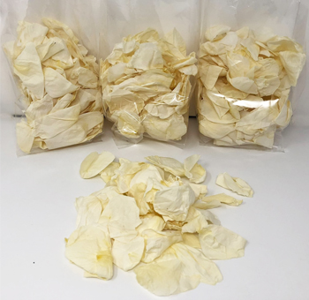 Romantic white dried rose petals ideal for wedding aisles, table decor, or elegant floral scattering at premium events.