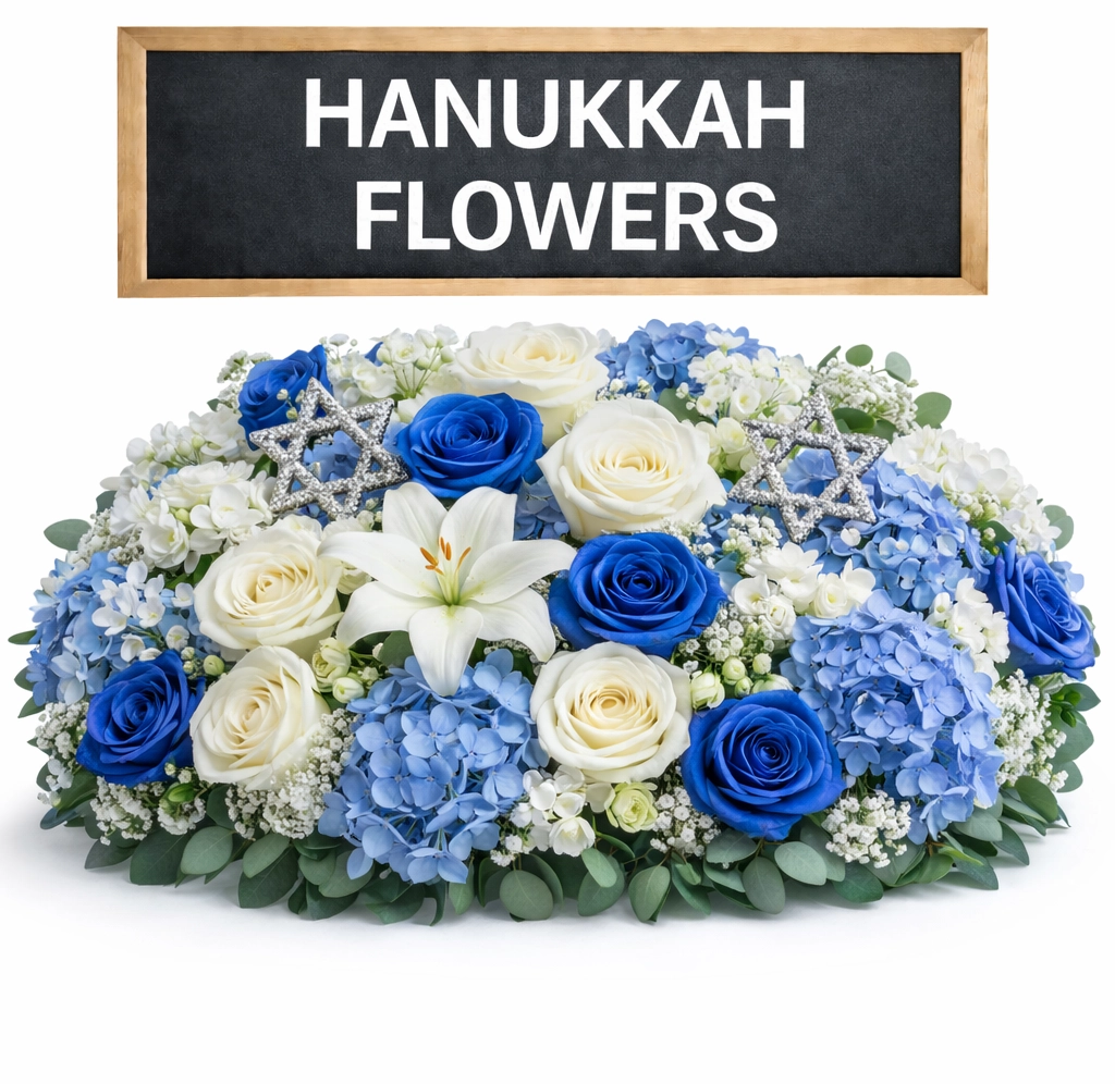 Hanukkah flowers with blue and colorful seasonal blooms styled alongside a menorah for elegant holiday gatherings and festive table decor.