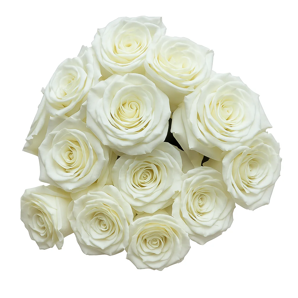 Elegant table centerpiece with Playa Blanca roses and soft greenery.
