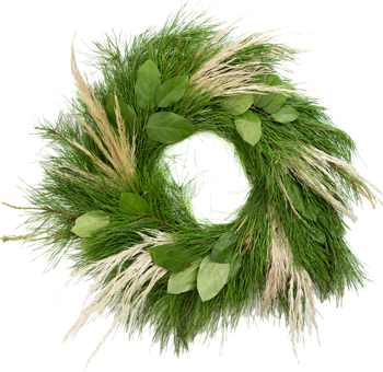 Sleigh Rider Wreath featuring pine foliage, pampas grass, and green leaves. A rustic and elegant holiday decoration for indoor or covered outdoor spaces.