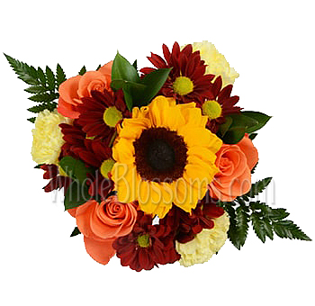 Golden yellow sunflowers and vibrant orange roses artfully arranged as a centerpiece, infusing weddings and events with cheerful warmth and elegance.