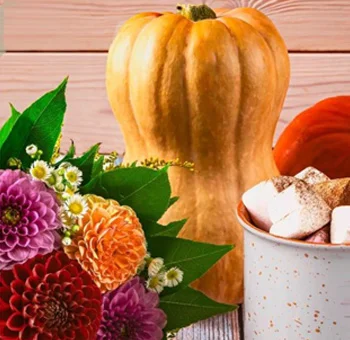 Fall centerpiece in bulk with fresh, vibrant flowers in burgundy, orange, purple, and yellow for weddings and events.