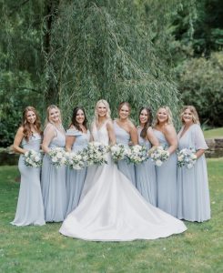 Bride and bridesmaids holding their bridal bouquets.