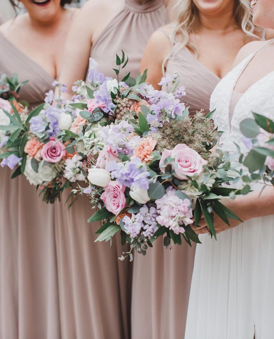 Lavender and light pink wedding bouquets.